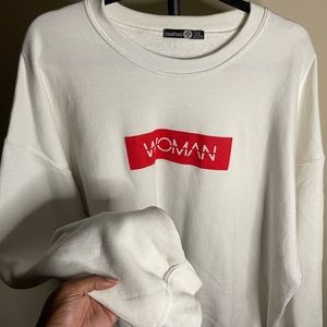 white crew neck ‘woman’ sweatshirt
